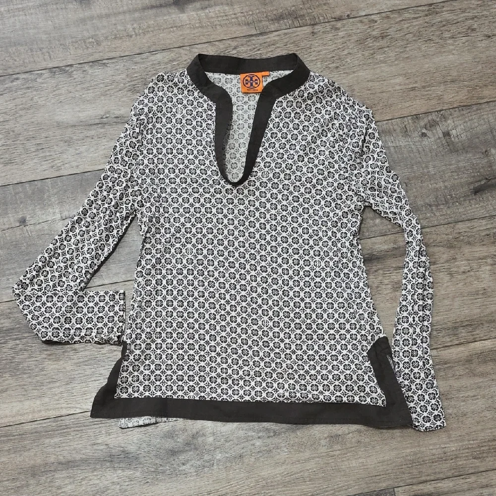 Tory Burch printed tunic top featuring a split neckline and long sleeves